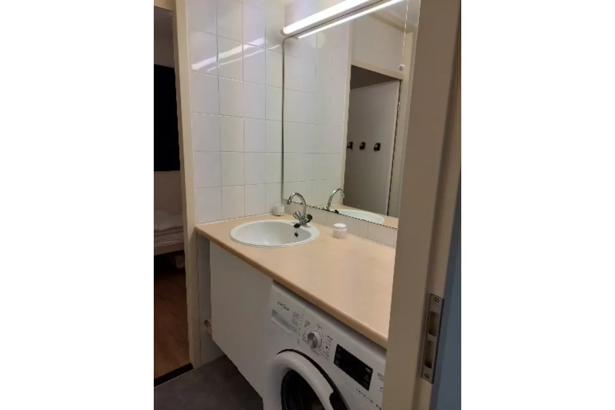 badkamer met wasmachine