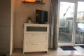 Spelletjeskast en tv
