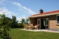 Terras op het zuiden, tuindeuren naar woonkamer